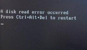 电脑开机出现黑屏提示A disk read error occurred的解决方法