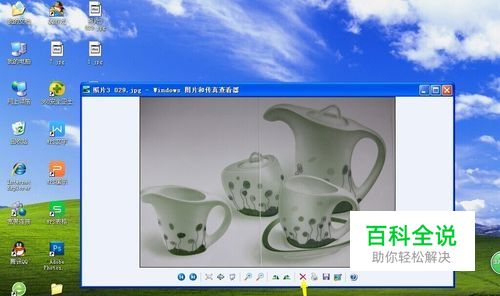 如何在电脑中快速的删除照片呢