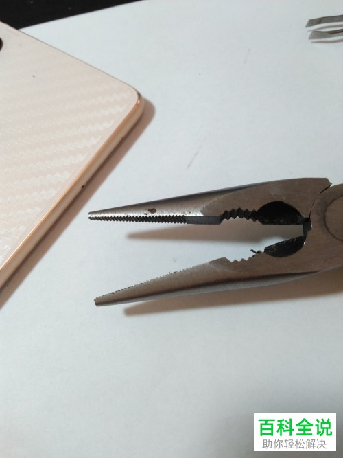 SIM卡的卡托滑到手机卡槽里了怎么办