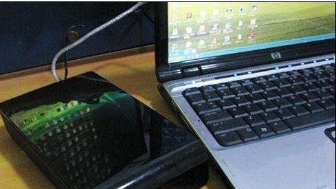 移动硬盘有响声读不出来怎么办